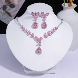 Elegant pink butterfly zircon necklace and earrings jewelry set on white display stand