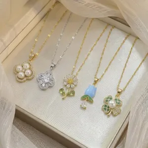 Elegant collection of floral pearl and cubic zirconia pendant necklaces in a luxury box