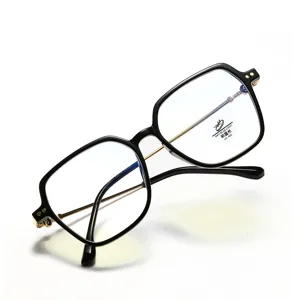 Detailed view of oversized square black glasses frame featuring anti-blue light clear lenses