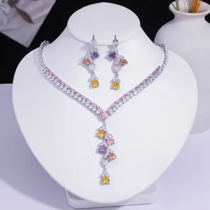 Colorful heart-shaped zircon necklace and earring jewelry set on professional display
