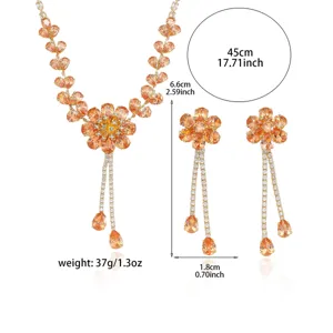 Parure collier et boucles d'oreilles fleur en zircone orange avec détails de taille