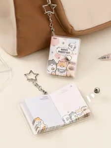 Mini transparent loose-leaf notebook with cute cat illustrations and star keychain detail view.