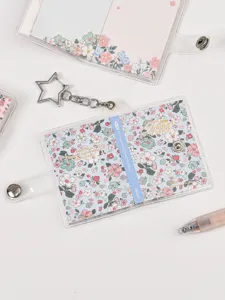Portable clear PVC mini binder notebook with floral cover design and star keychain, cute stationery.