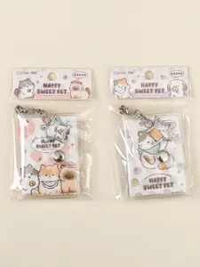 Cute mini journal keychain with star pendant, portable pocket notebook for daily notes.