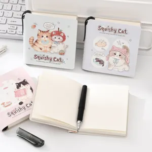 Cute pocket notebook set with adorable cat illustrations, pen holder and smooth pages for students.