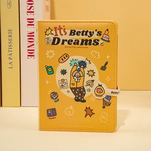 Gedetailleerde weergave van geel origineel illustratiedagboek met Betty's Dreams-ontwerp