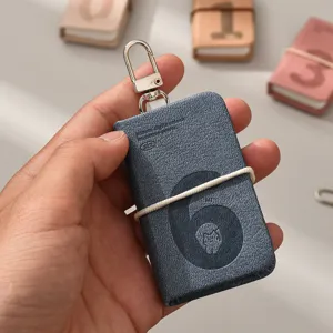 Mini leather notebook keychain with number 6 emboss, portable cute memo pad charm for bags.