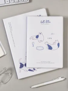 Vue détaillée du carnet A5 avec motif de chat, journal ligné avec couverture transparente et design.