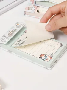 Primer plano de un lindo bloc de notas de gato con líneas y 80 hojas desprendibles.
