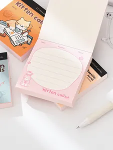 Gros plan d'un bloc-notes rose chat mignon avec sections date et humeur.