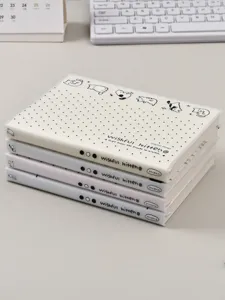 Joli carnet à points avec illustrations de chats, couverture transparente et design esthétique.
