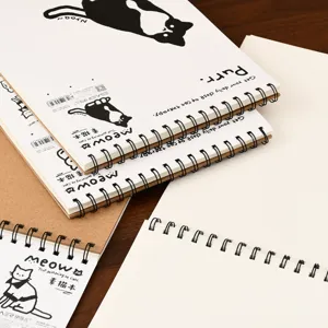 A4 spiral sketchbook with cute cat illustration, perfect for drawing, sketching, and art.