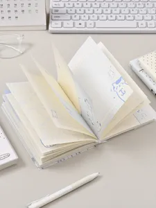 Carnet de notes journalier mignon avec illustration de chat et pages quadrillées pour notes.