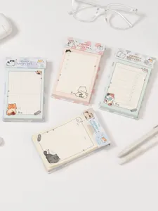 Detalle de cuatro bonitos blocs de notas con temática de gatos y perros para niños