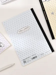 Vista dettagliata del grazioso taccuino B5 puntinato con copertina blu, ideale per scuola e appunti.