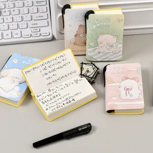 Mini cuaderno de bolsillo bonito y portátil con cubierta de dibujos animados y páginas interiores.