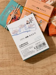 Mini folding coloring notebook set with traditional Chinese cultural design, compact paper art pads.