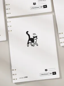 Nahaufnahme eines minimalistischen B5-Ringbuchs mit einer süßen schwarz-weißen Katzenillustration