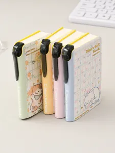 Detailed view of cute mini pocket notebook, colorful portable memo pad with sweet cat illustration.