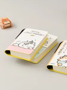 Detail of cute cat pocket notebooks with built-in pen holder and yellow spine