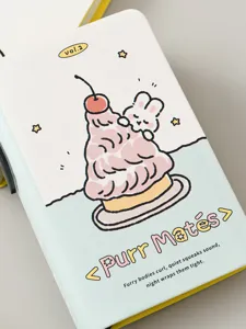Detail of cute ins-style pocket notebook with rabbit illustration and pen slot