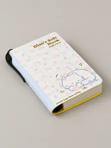 Cute blue plaid pocket notebook detail close up, portable mini diary book with cat cover art.