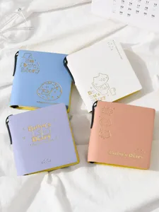 Bonito cuaderno de bolsillo diario con soporte para bolígrafo y diseño de gato dorado.