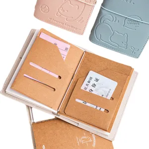 Cute embossed leather travel journal with internal functional card slots and pockets