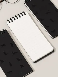 Portable loose-leaf spiral notepad with lined inner pages and cute black cat covers.
