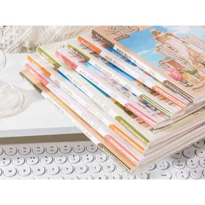 Detailed view of Spanish travel themed lined notebooks stack, thick paper, student journal.