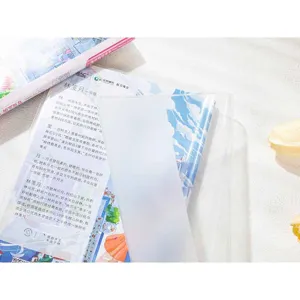 Transparent frosted notebook cover detail, durable PVC protective sleeve for student notebooks.
