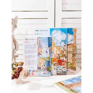 Thickened student notebook with Spanish artistic landscape cover design, lined inner pages.