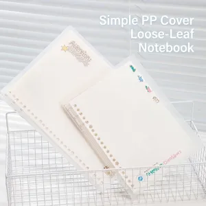 Cuaderno A5 de hojas sueltas minimalista con tapa de PP transparente y dinosaurios.