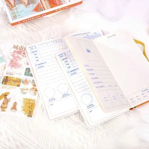 Cute hardcover magnetic weekly planner notebook with colorful pages and stickers for journaling.
