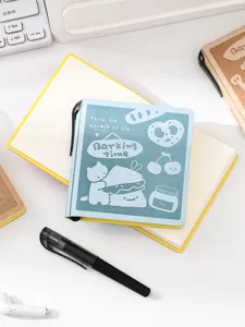 Cute blue pocket notebook detail, compact stationery with lovely cat and bread illustrations.