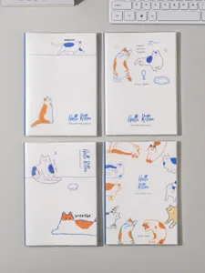 Lot de quatre cahiers A5 lignés avec des illustrations de chats et couvertures pailletées