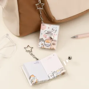 Mini clear shell keychain memo pad cute cartoon cat design portable pocket notebook for daily use.