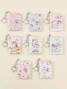 Mini cute notebook keychain detail showing cartoon cat covers, transparent shell and star charm.
