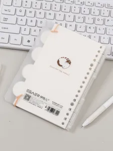 Detailed view of the cute six-hole loose-leaf notebook with clear cover and cat illustration.