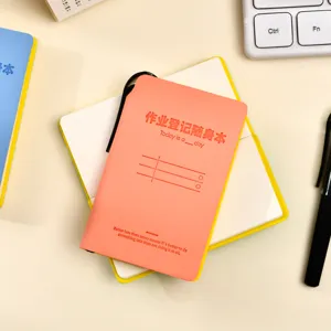 Mini cuaderno portatil con portaboligrafos, bloc de notas naranja para estudio diario.