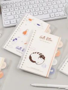 6-ring loose-leaf notebook with clear cover and cute cat illustrations for daily journaling.