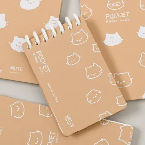 Kraftpapier spiraal notitieboekje met schattige kattenillustraties voor dagelijkse notities.