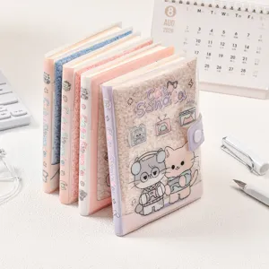 Cute fuzzy Cat Sonata 64K notebook with plush cover and snap closure in pastel colors