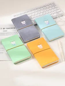 Vue détaillée de carnets chat thé aux perles colorés en gris, bleu, vert et orange