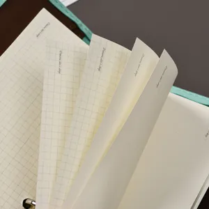 Quaderno con risme a spirale A7 a griglia in pelle morbida per ufficio e studio