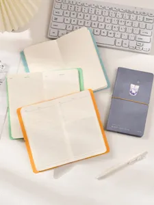 Vue détaillée des carnets chat thé au lait montrant des pages quadrillées et lignées