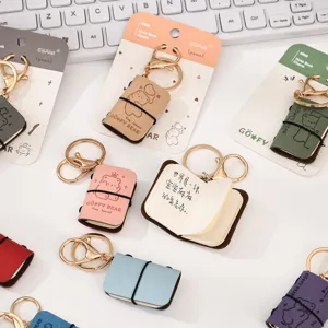 Portachiavi mini taccuino in pelle PU ciondolo orsetto carino zaino borsa scuola.