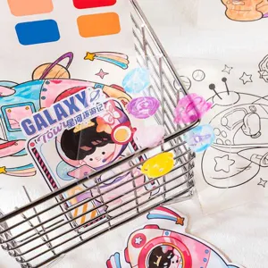 Space theme coloring book detail showing cute astronaut illustration card and metal wire basket.