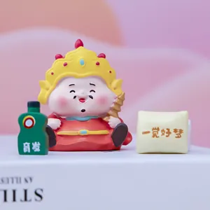 Detailed close-up of a cute Wealth God figure with hair growth bottle and pillow