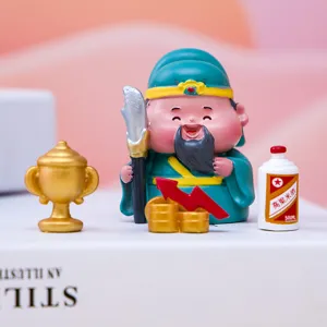 Detailed view of Guan Yu Fortune God figurine with miniature wine bottle and trophy